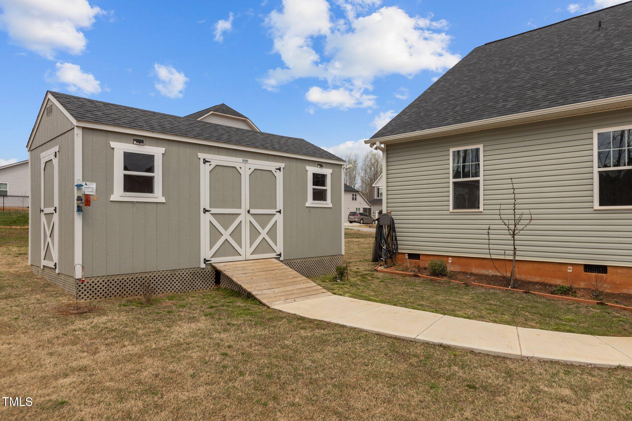 240 Northview Drive Middlesex, NC 27557 - Photo 45 of 58 a view of a house with a yard