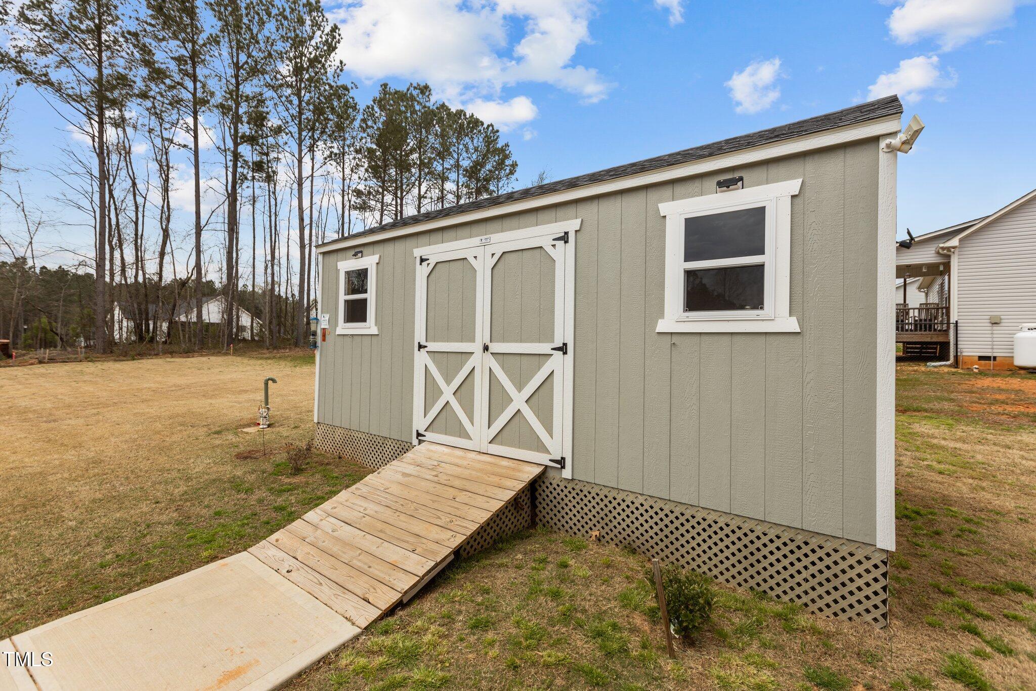 240 Northview Drive Middlesex, NC 27557 - Photo 49 of 58 a view of a house with backyard