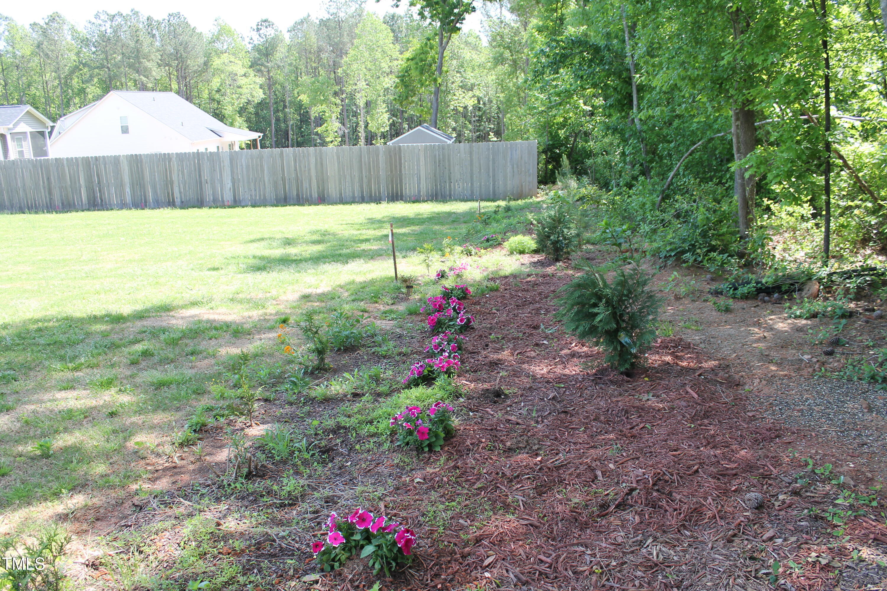 240 Northview Drive Middlesex, NC 27557 - Photo 54 of 58 a view of a backyard with a small cabin