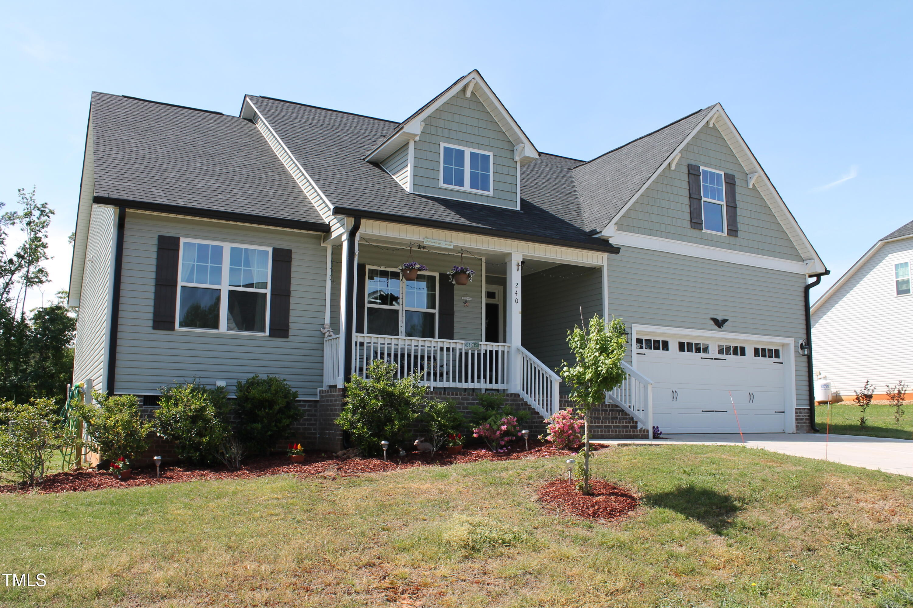 240 Northview Drive Middlesex, NC 27557 - Photo 5 of 58 a front view of a house with a yard
