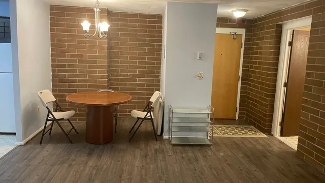 a bathroom with a sink toilet and mirror