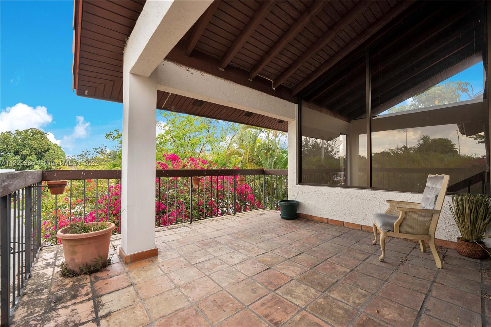 830 East 18th Street Hialeah, FL 33013 - Photo 28 of 37 a view of a porch with furniture and garden