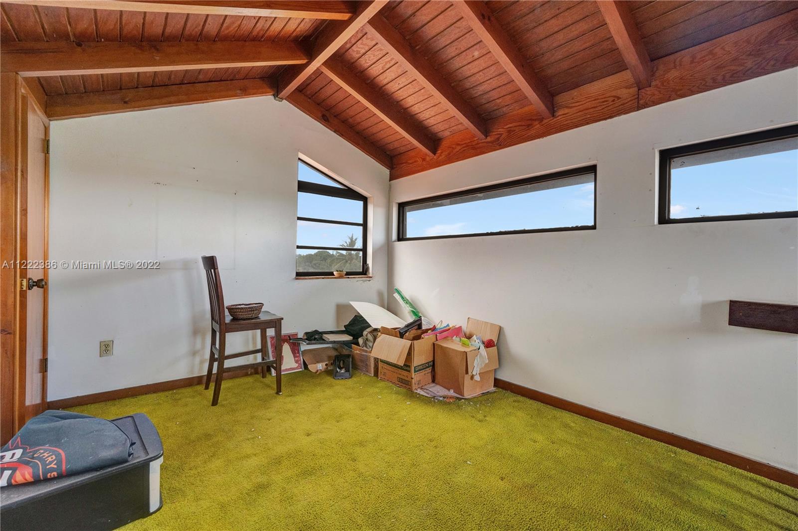 830 East 18th Street Hialeah, FL 33013 - Photo 29 of 37 a room with furniture and a table