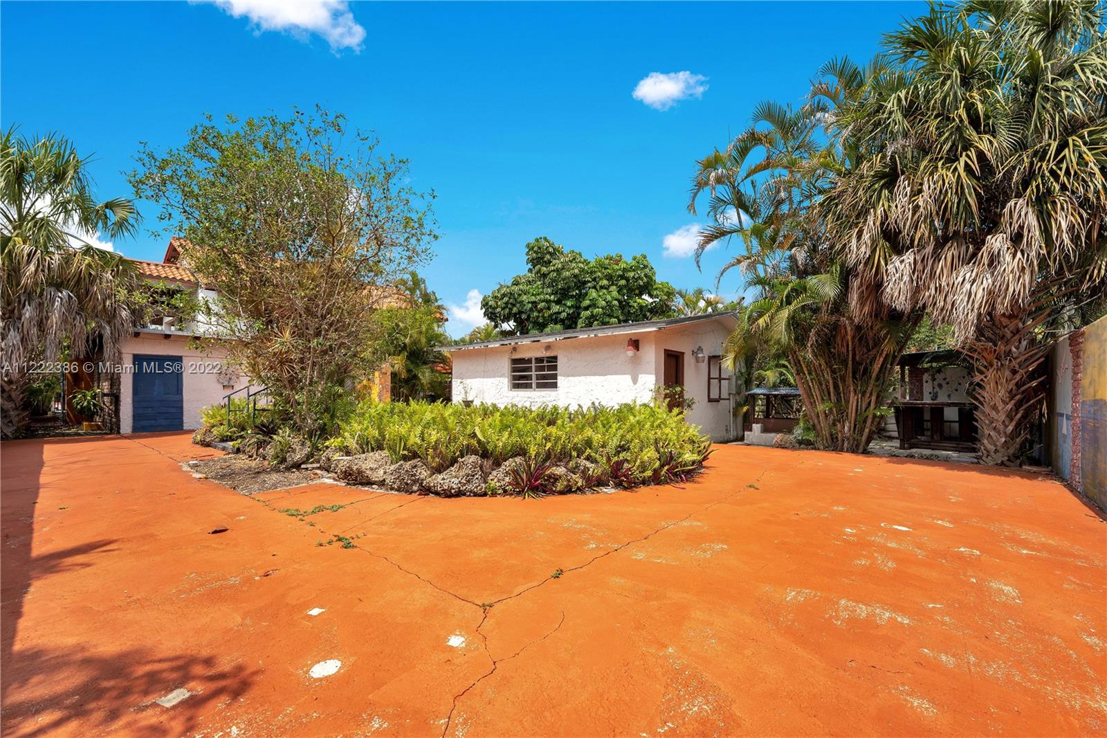 830 East 18th Street Hialeah, FL 33013 - Photo 31 of 37 a front view of a house with a yard