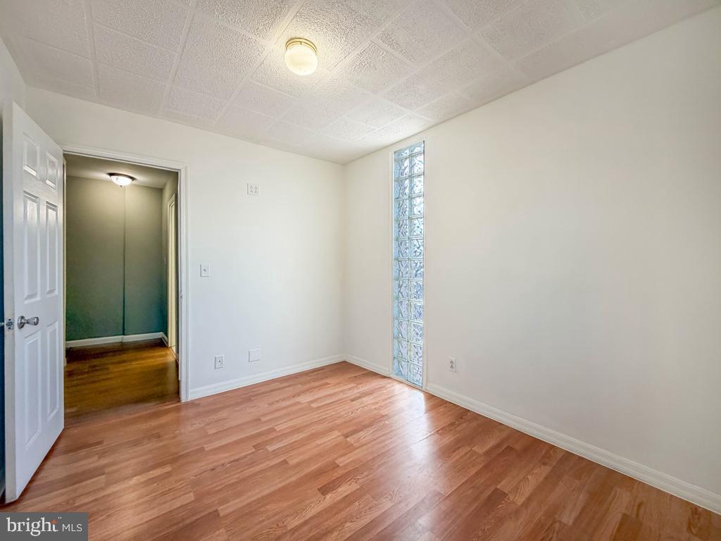 3850 Woodhaven Road, Unit 901 Philadelphia, PA 19154 - Photo 19 of 24 wooden floor in an empty room