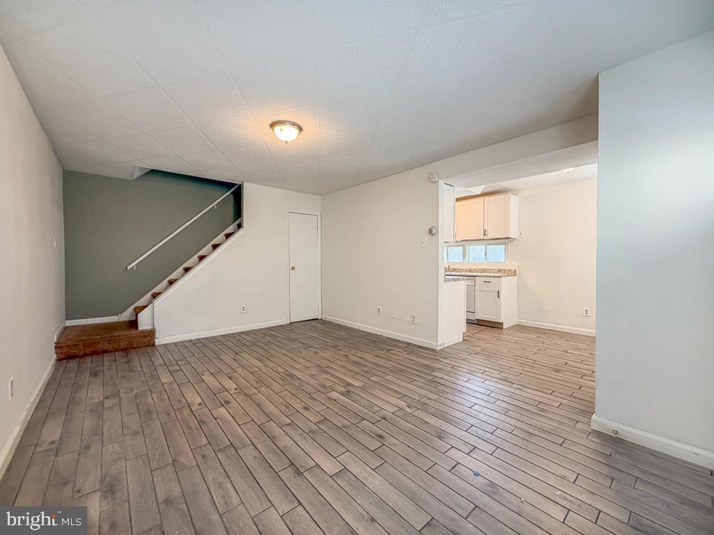 3850 Woodhaven Road, Unit 901 Philadelphia, PA 19154 - Photo 9 of 24 a view of empty room with wooden floor