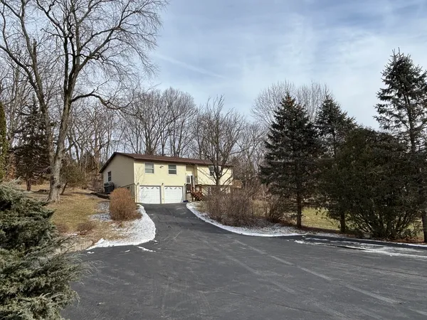$299,500 | 61 West Timberline Drive, Blue Grass, IA 52726