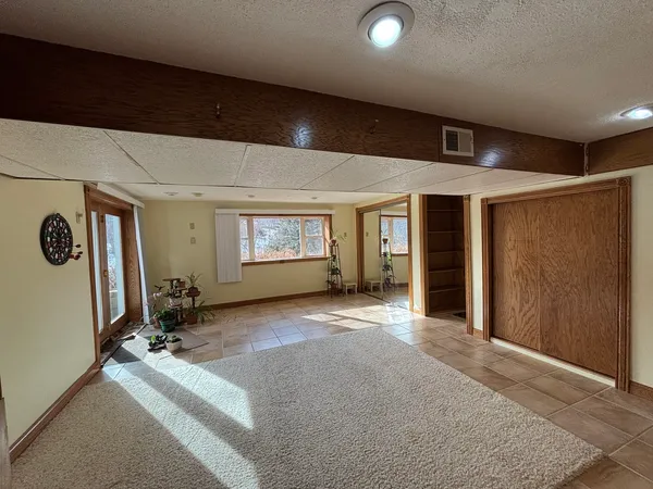 $299,500 | 61 West Timberline Drive, Blue Grass, IA 52726