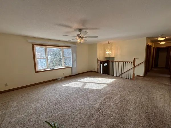 $299,500 | 61 West Timberline Drive, Blue Grass, IA 52726