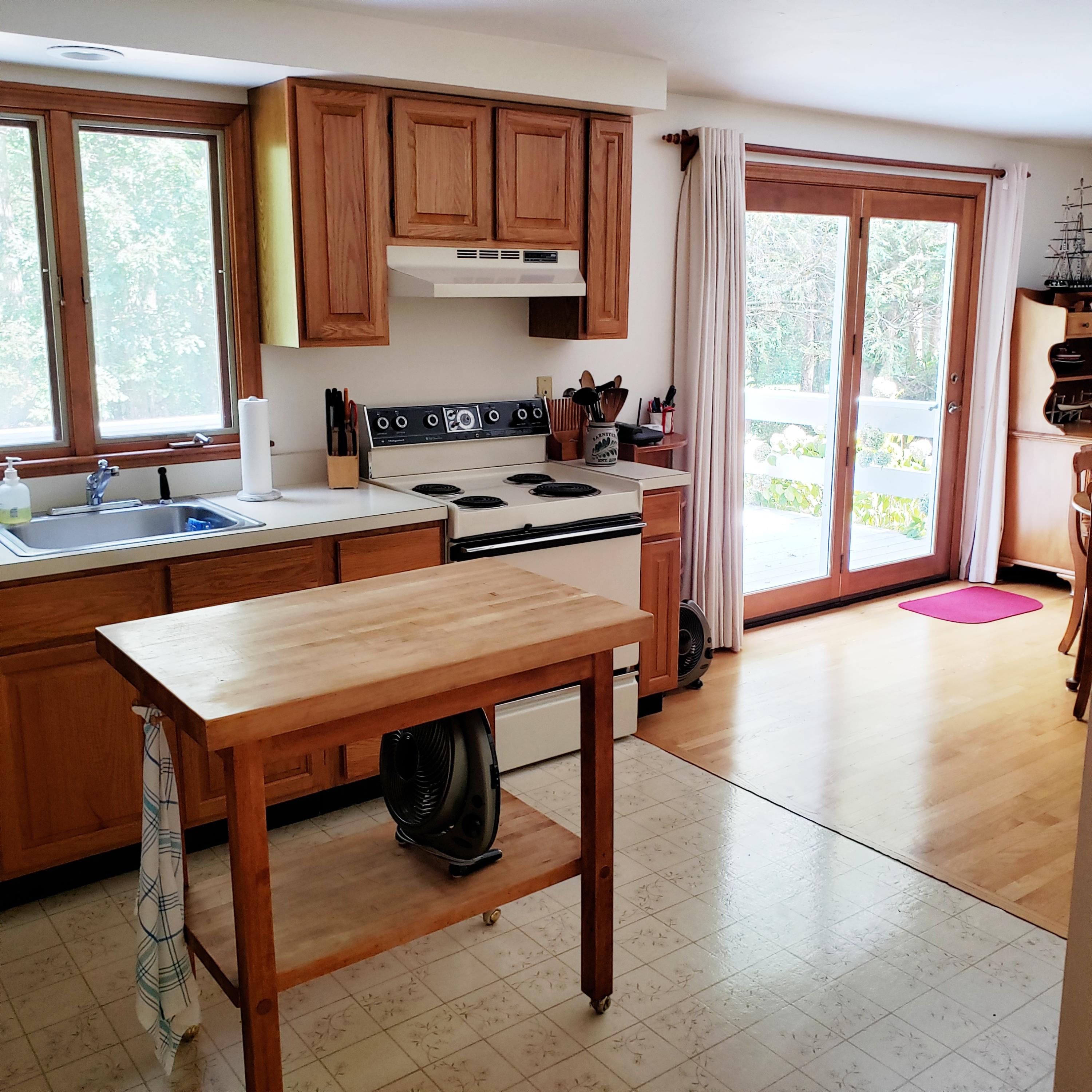 56 Flintrock Road Barnstable, MA 02630 - Photo 9 of 17 Kitchen/Dining Deck Access