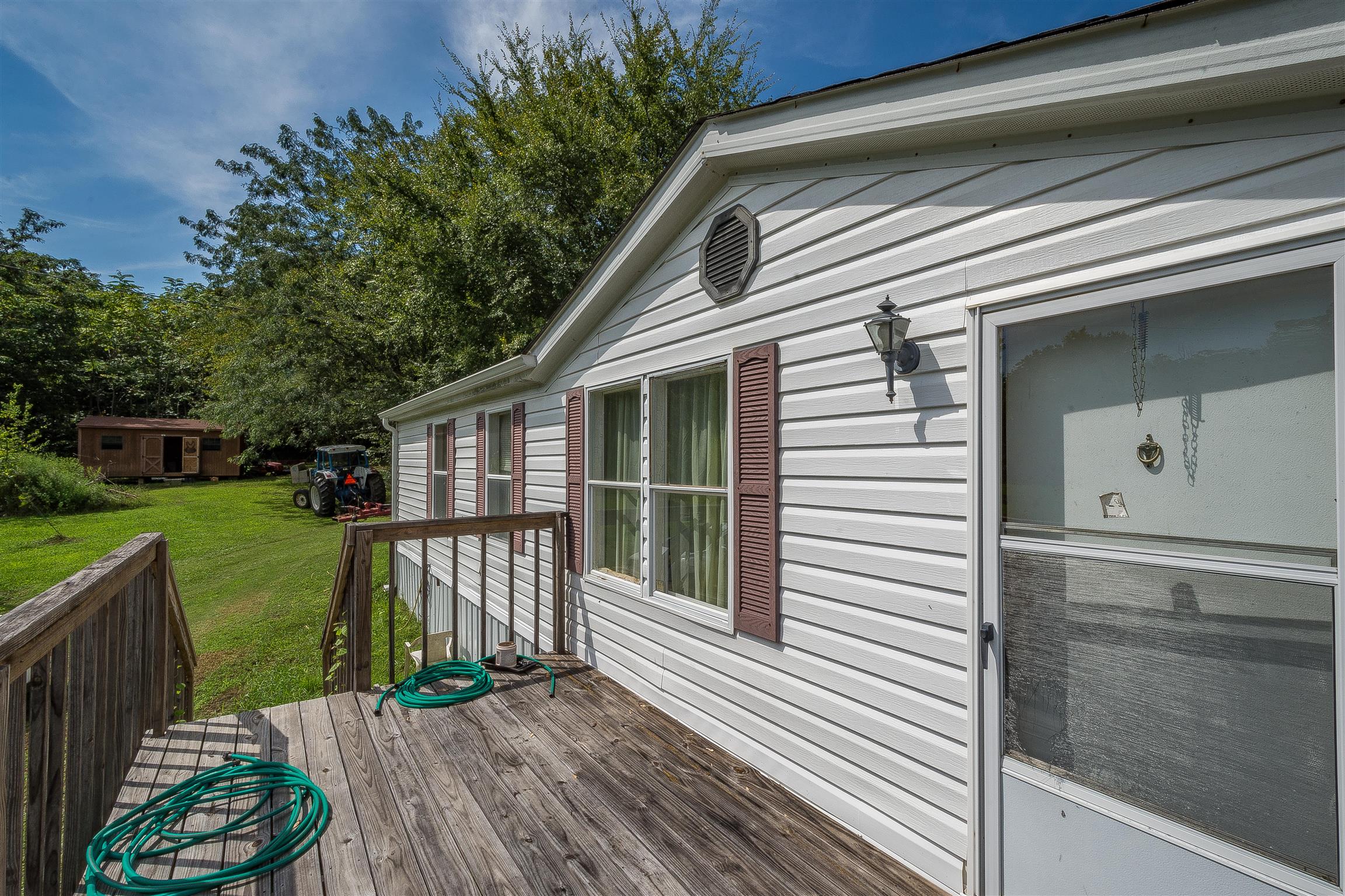667 Petty Hollow Road Prospect, TN 38477 - Photo 16 of 28 a view of a house with a porch