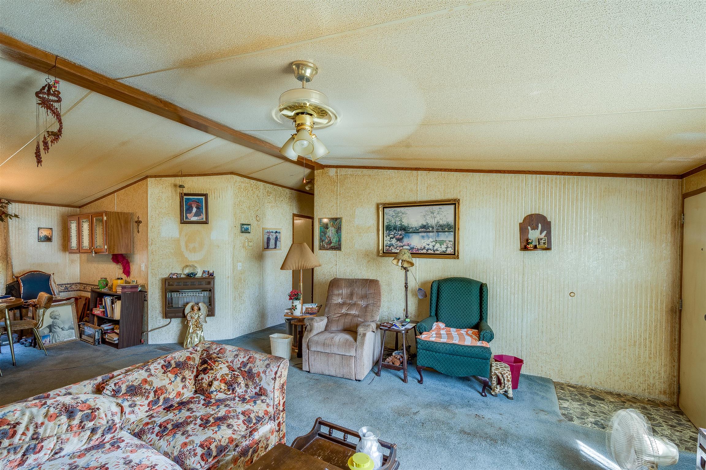 667 Petty Hollow Road Prospect, TN 38477 - Photo 19 of 28 a living room with furniture and a couch