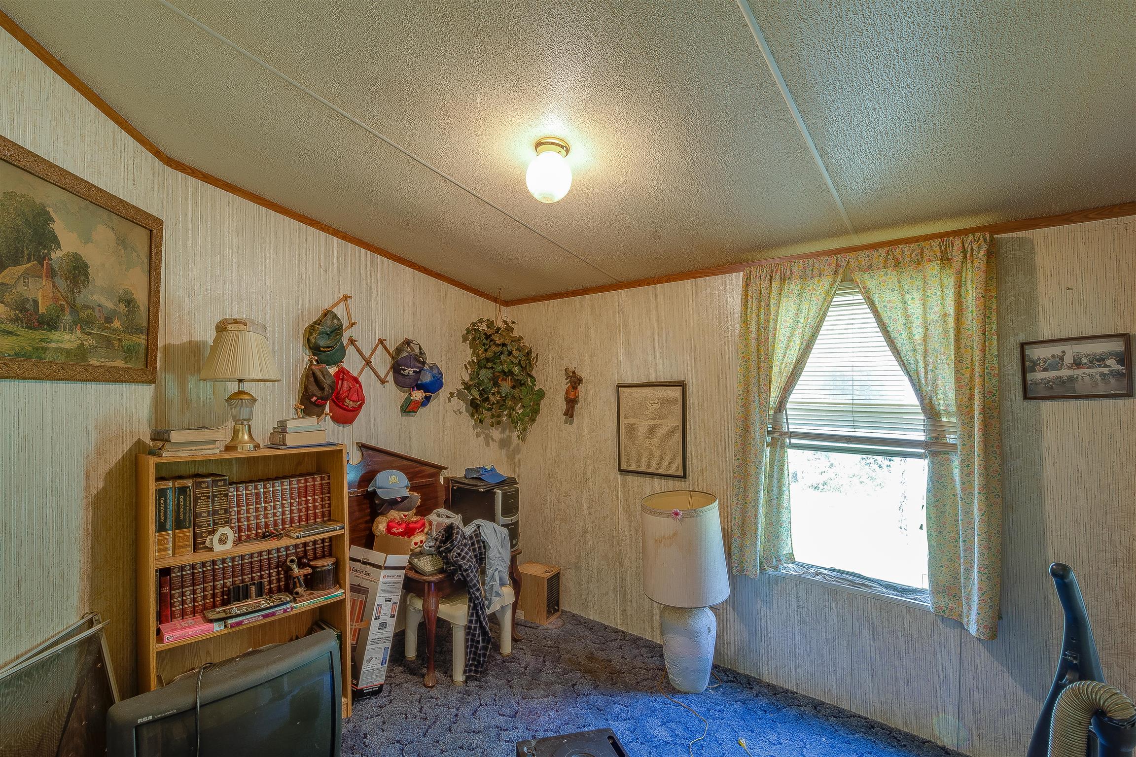 667 Petty Hollow Road Prospect, TN 38477 - Photo 28 of 28 a room with furniture and a window