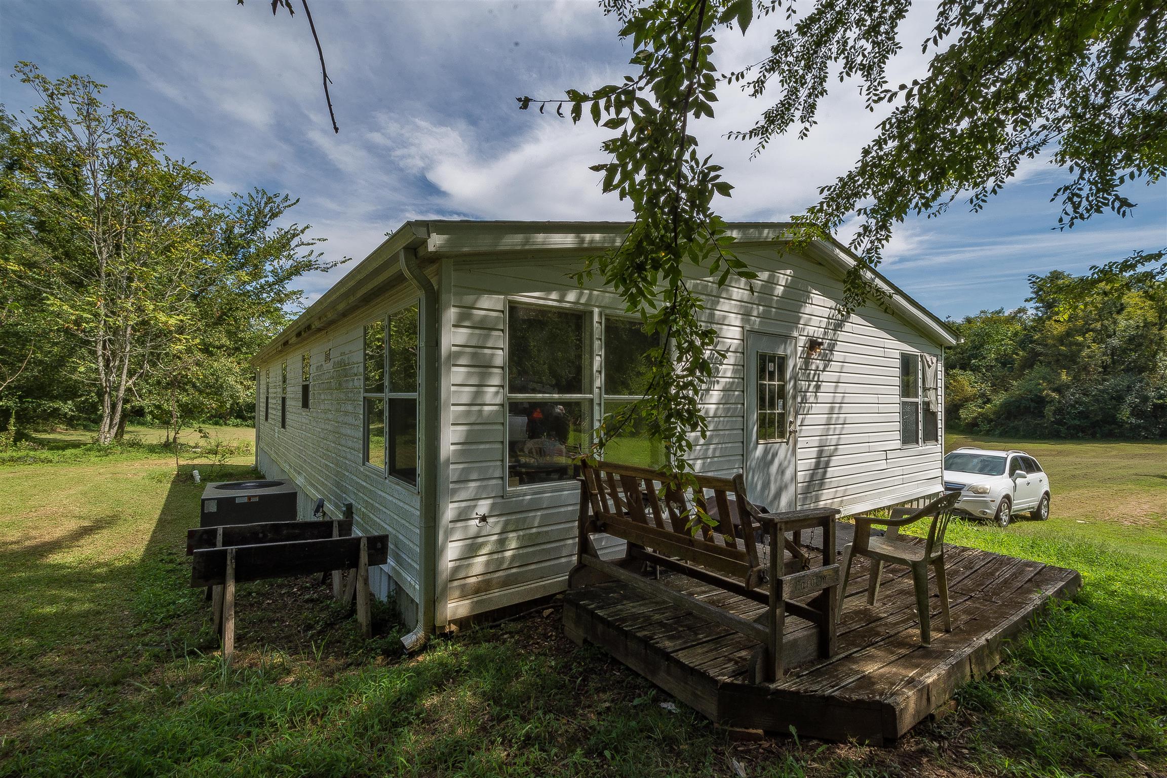 667 Petty Hollow Road Prospect, TN 38477 - Photo 8 of 28 a view of a chair and table in the patio