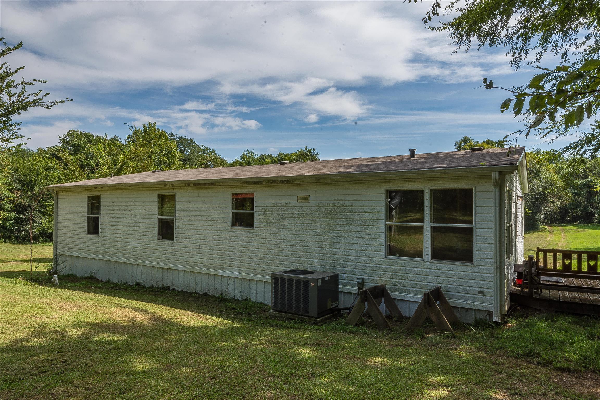 667 Petty Hollow Road Prospect, TN 38477 - Photo 9 of 28 a view of a house with a yard