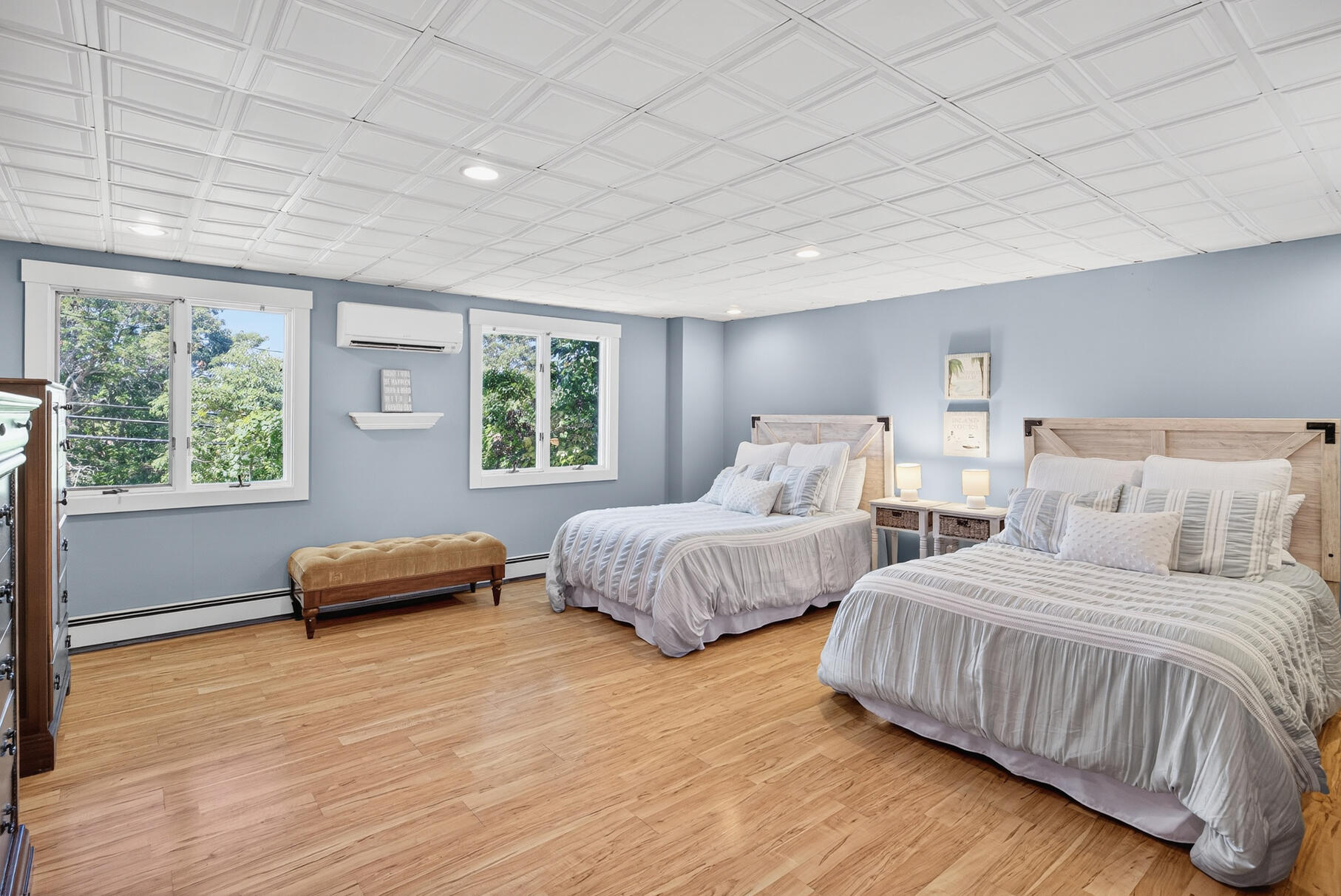 24 Jae Road Falmouth, MA 02556 - Photo 16 of 27 a bedroom with two beds and a large window