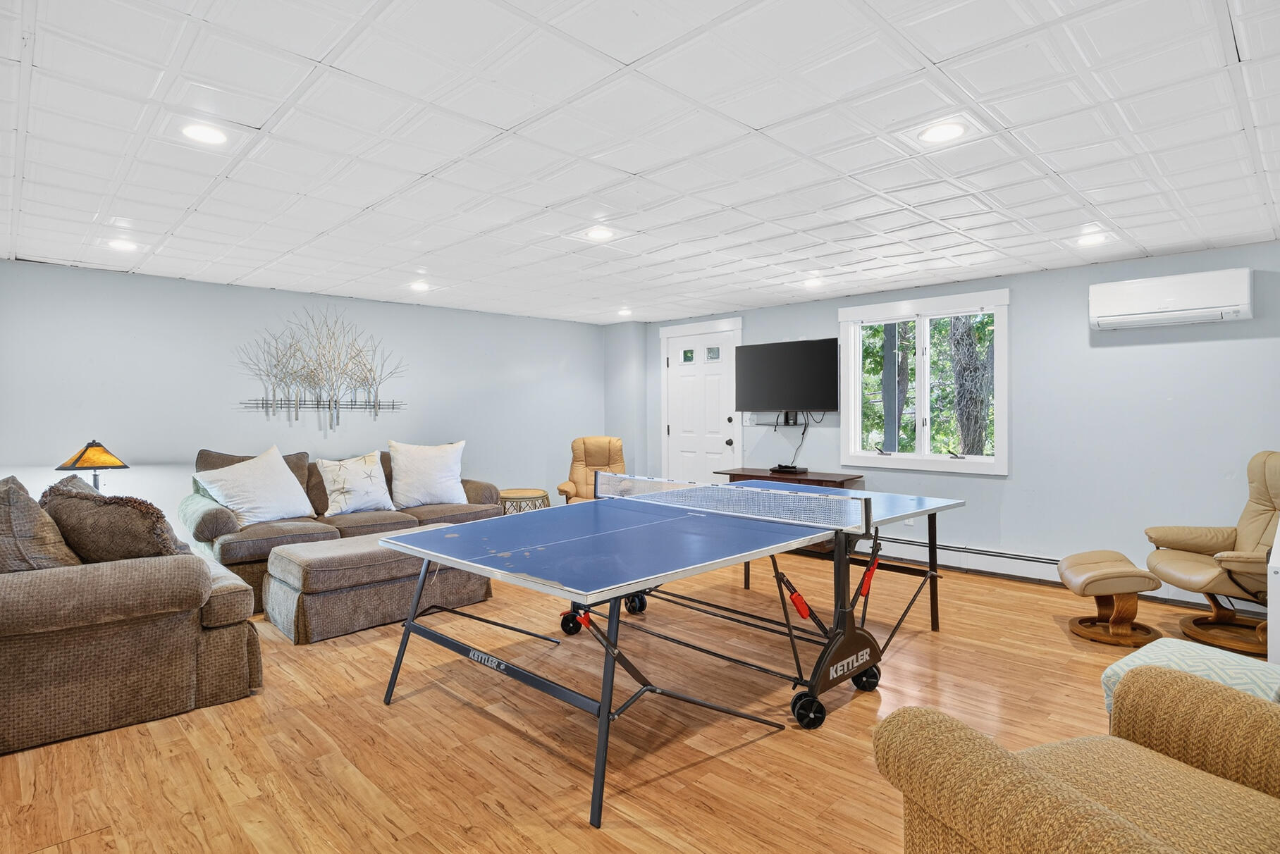 24 Jae Road Falmouth, MA 02556 - Photo 17 of 27 a living room with furniture and a flat screen tv