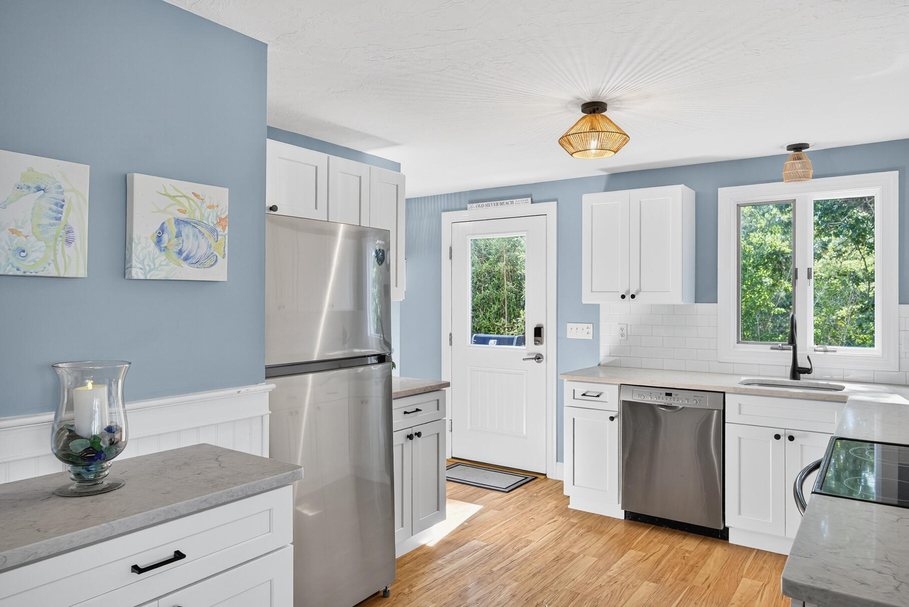 24 Jae Road Falmouth, MA 02556 - Photo 4 of 27 a kitchen with a refrigerator and a sink