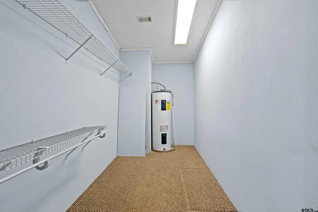 a view of a hallway with closet