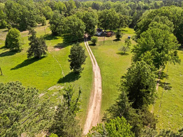a view of a lake with a building in the background