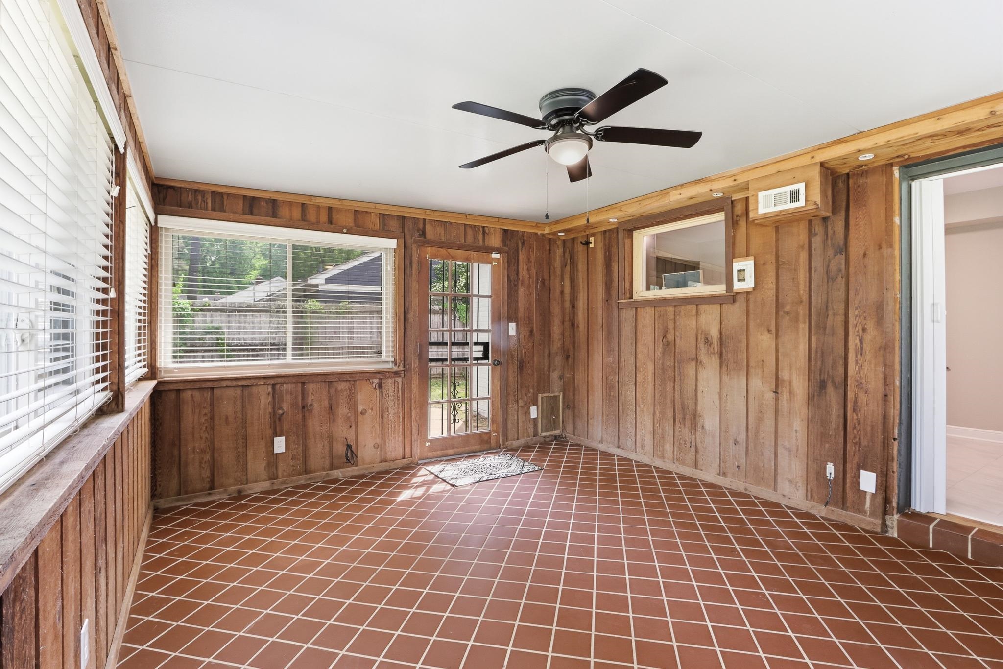 312 Fernway Road Memphis, TN 38117 - Photo 20 of 38 Unfurnished room with wooden walls and ceiling fan