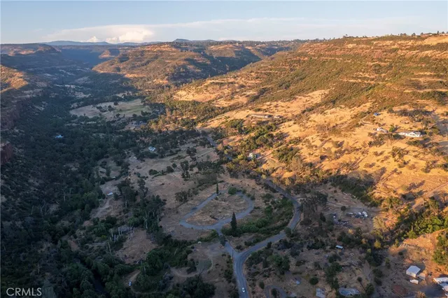 a view of a city with mountains in the background