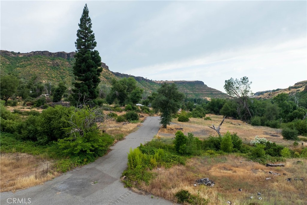 2321 Honey Run Road Chico, CA 95928 - Photo 21 of 35 a view of a lake with mountains in the background