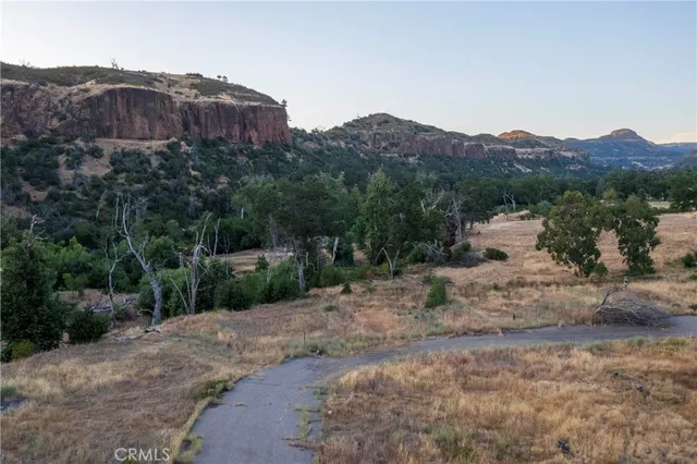 a view of a backyard of a house