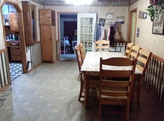1547 Lee Miller Road Silsbee, TX 77656 - Photo 3 of 3 a dining room with furniture and entryway
