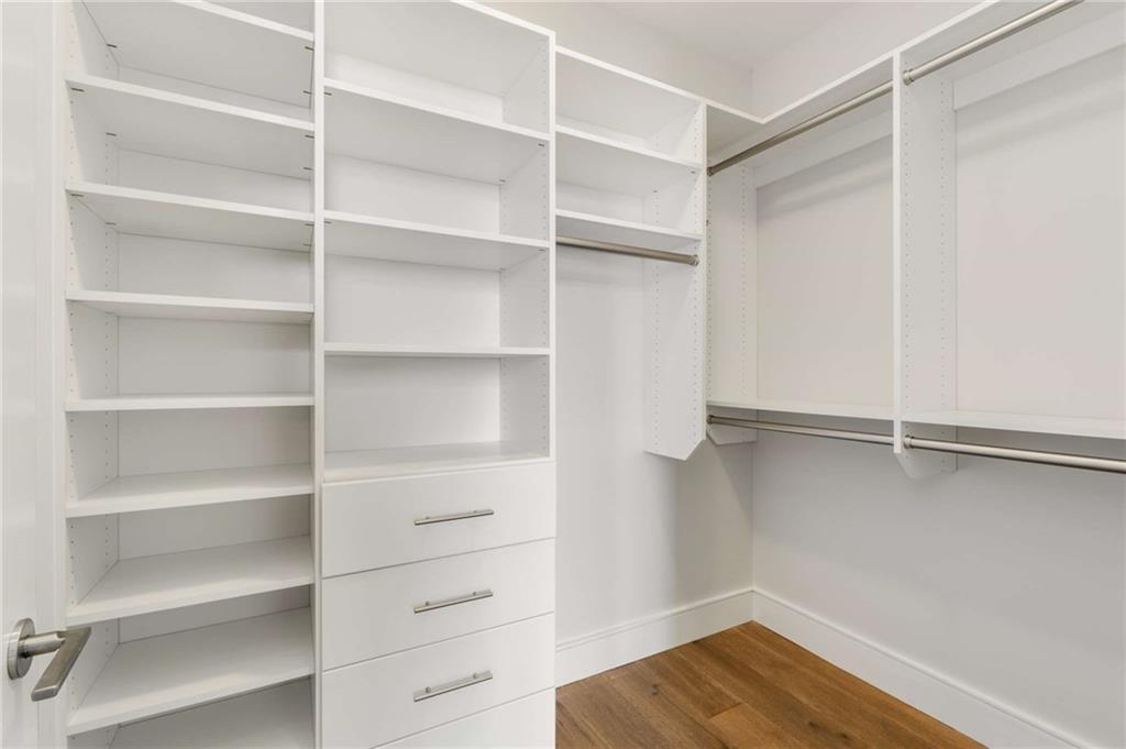 3376 Peachtree Road Northeast, Unit 33B Atlanta, GA 30326 - Photo 16 of 45 a view of walk in closet with empty racks