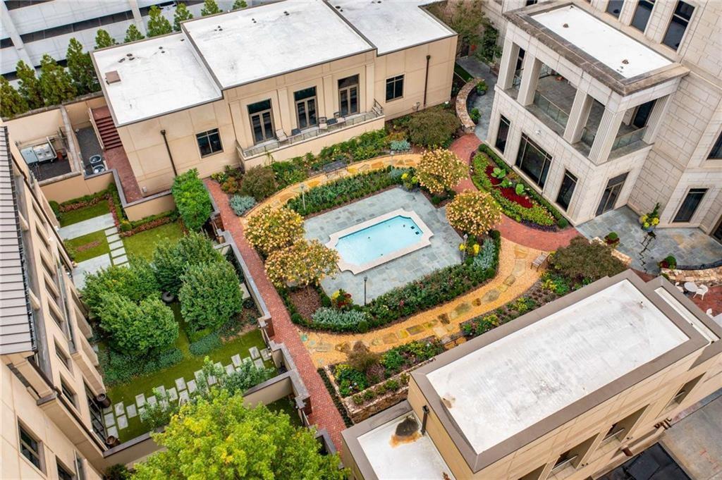 3376 Peachtree Road Northeast, Unit 33B Atlanta, GA 30326 - Photo 38 of 45 an aerial view of a house with a yard and potted plants