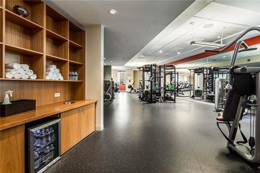 3376 Peachtree Road Northeast, Unit 33B Atlanta, GA 30326 - Photo 44 of 45 a view of a room with gym equipment