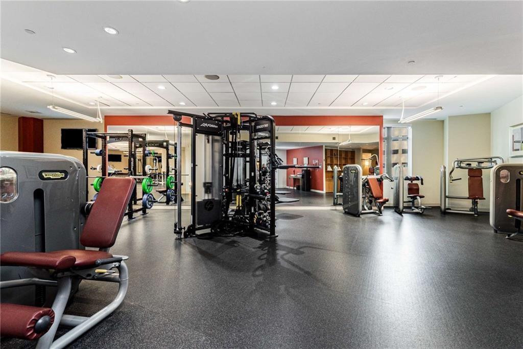 3376 Peachtree Road Northeast, Unit 33B Atlanta, GA 30326 - Photo 45 of 45 a view of a room with gym equipment