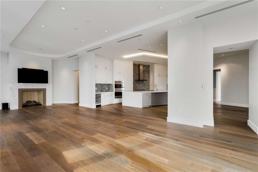 3376 Peachtree Road Northeast, Unit 33B Atlanta, GA 30326 - Photo 5 of 45 a view of a livingroom with a fireplace