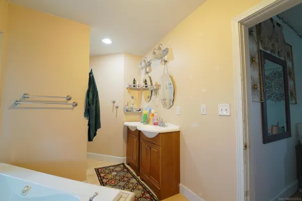 a bathroom with a sink and toilet