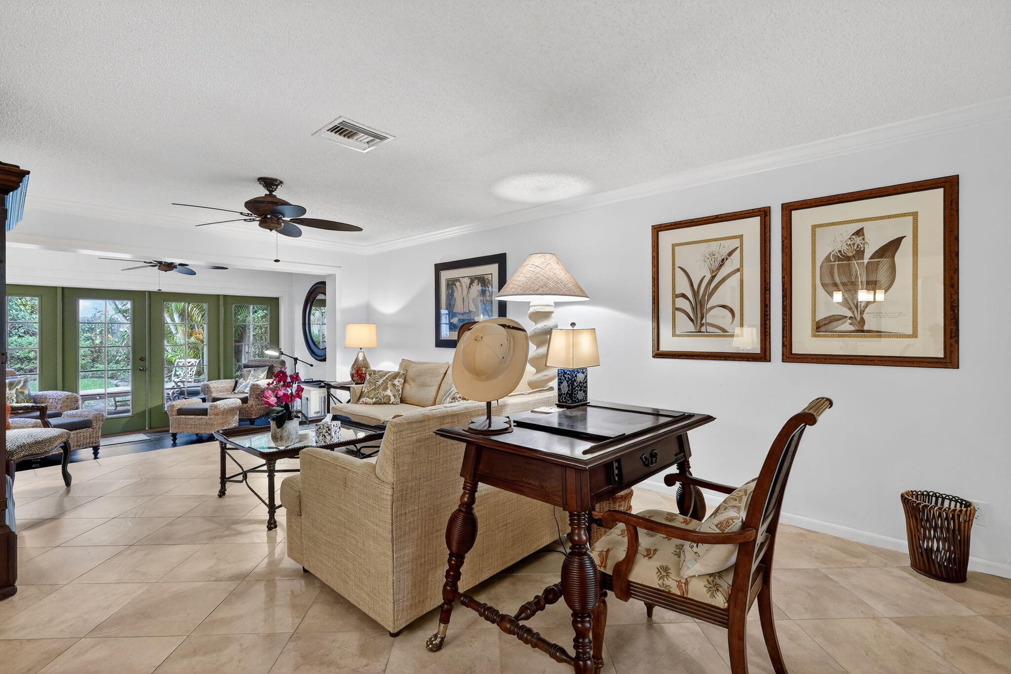 318 Southeast 7th Avenue, Unit 3 Delray Beach, FL 33483 - Photo 3 of 26 a living room with furniture and a large window