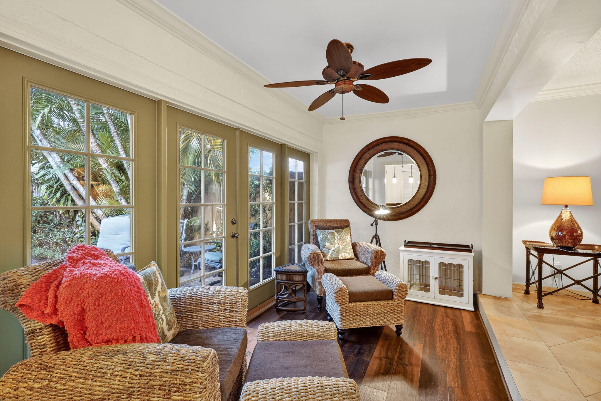 318 Southeast 7th Avenue, Unit 3 Delray Beach, FL 33483 - Photo 8 of 26 a living room with furniture a clock and a large window