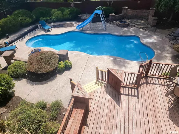 a view of outdoor space swimming pool and outdoor seating