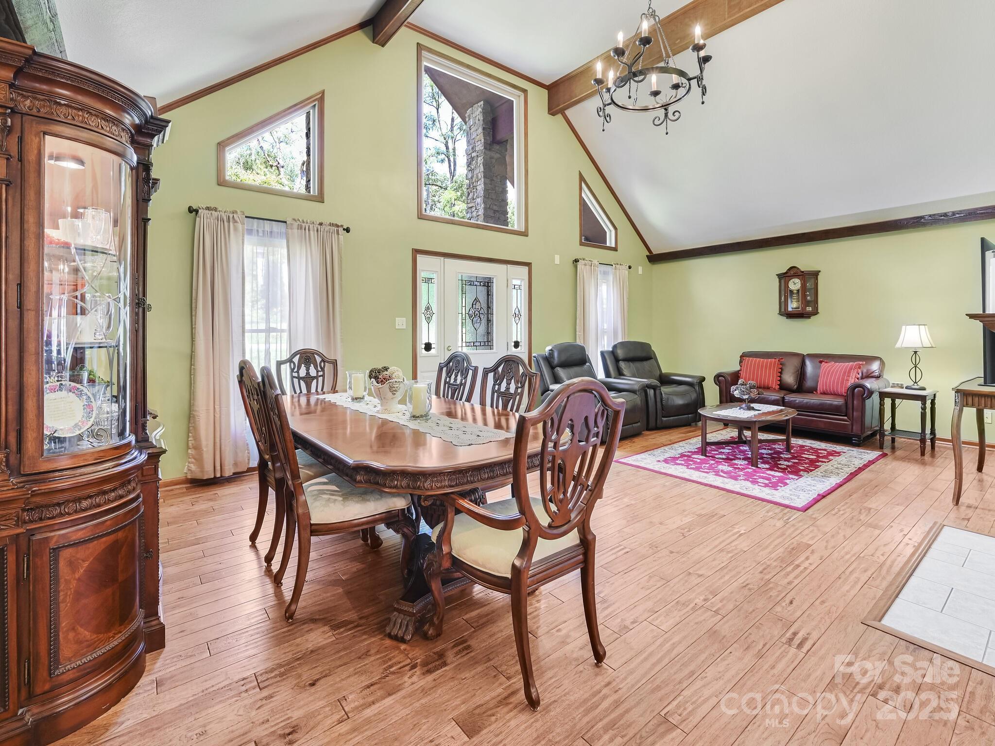 20 Brooks Cove Road Candler, NC 28715 - Photo 11 of 43 a view of a dining room with furniture and wooden floor