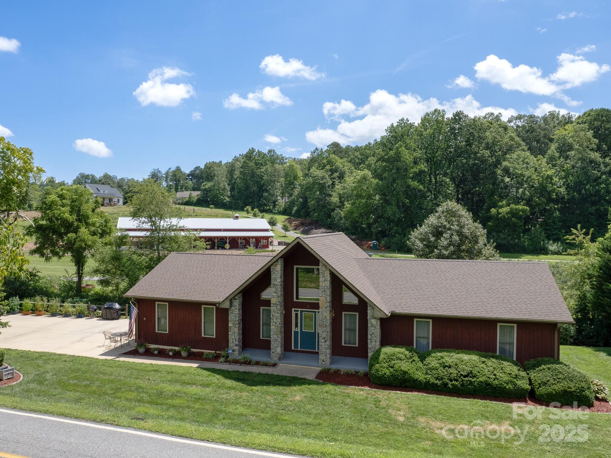 20 Brooks Cove Road Candler, NC 28715 - Photo 2 of 43 a aerial view of a house with a yard