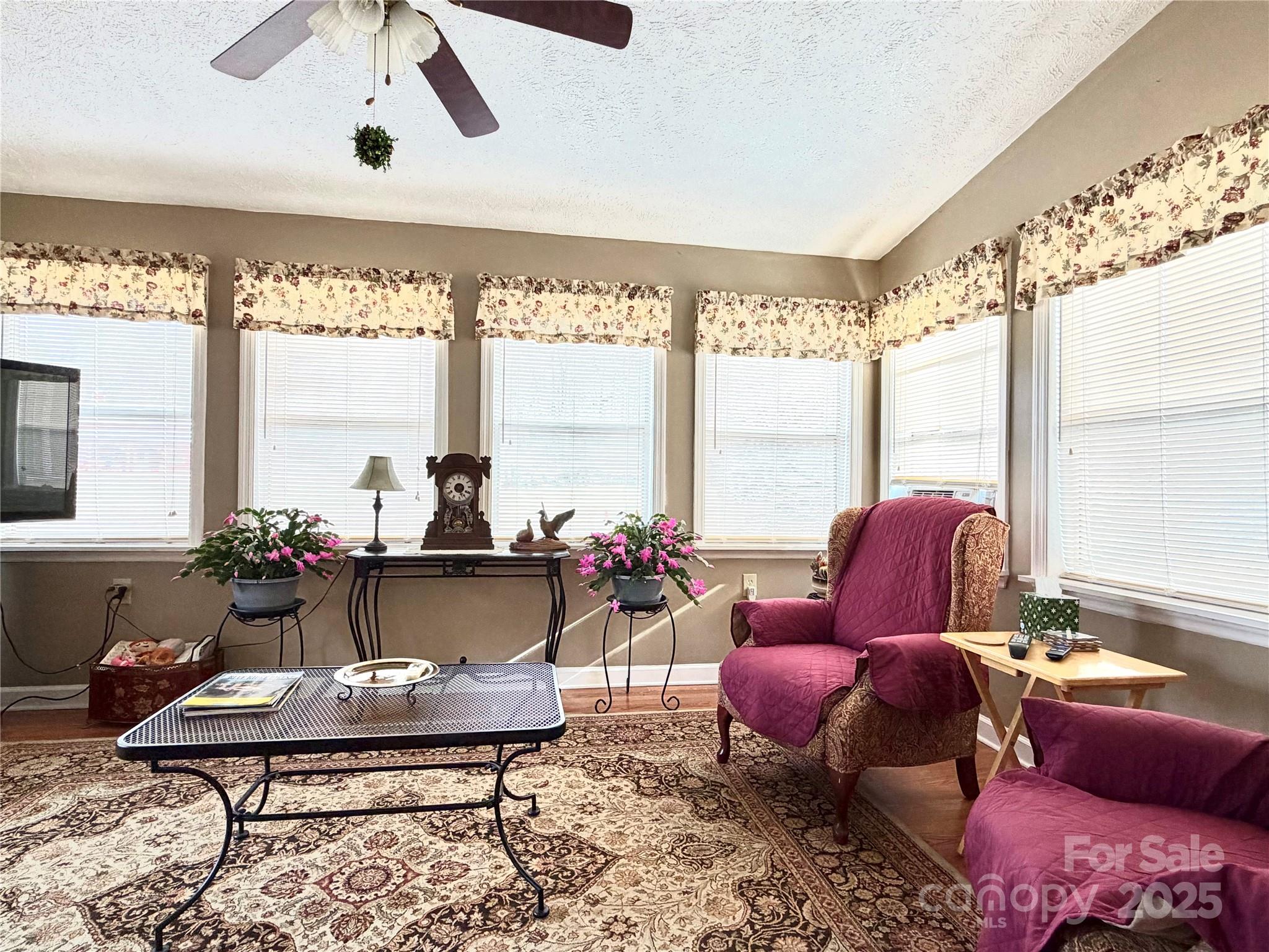 20 Brooks Cove Road Candler, NC 28715 - Photo 23 of 43 a living room with furniture and a large window