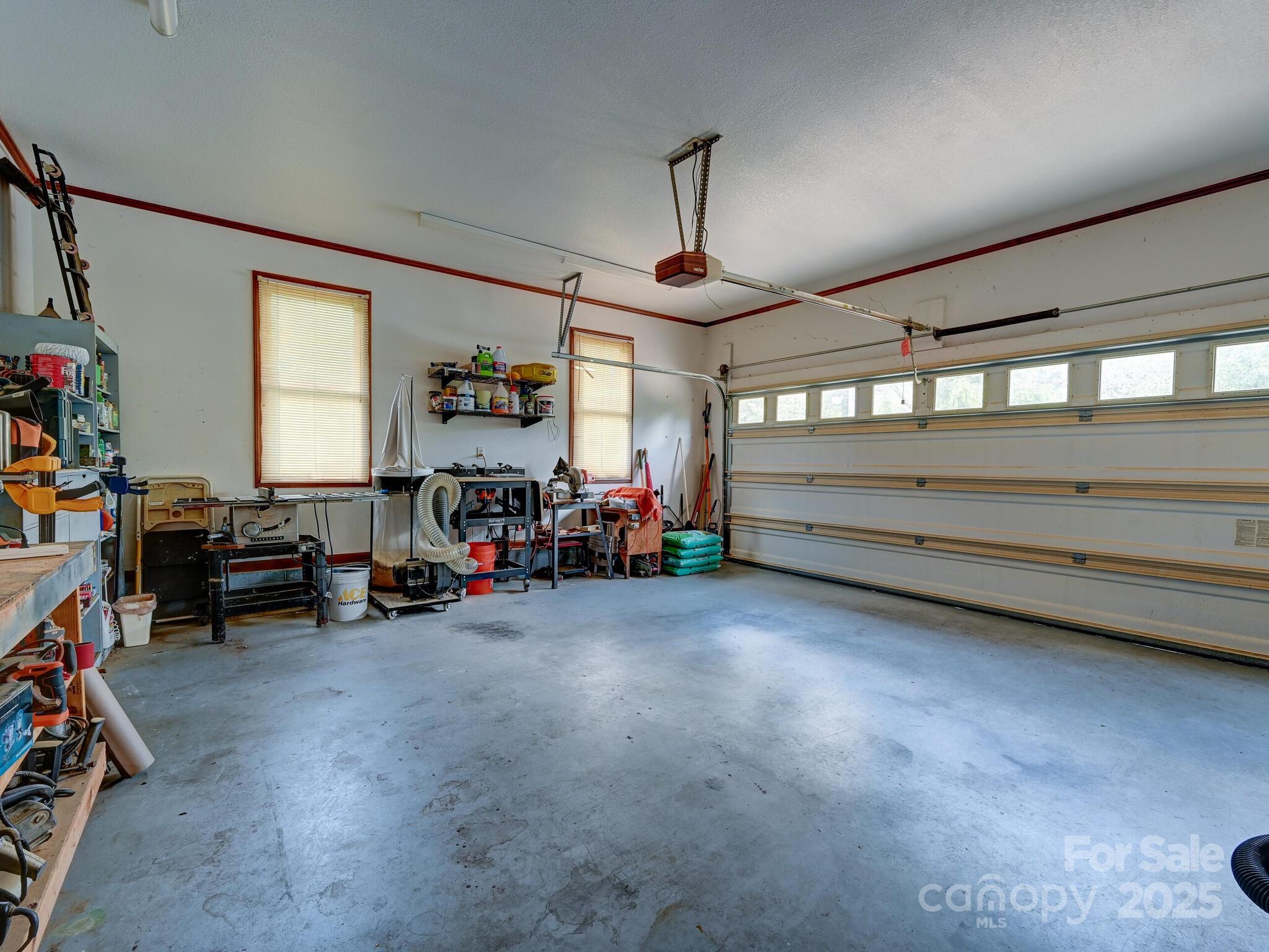 20 Brooks Cove Road Candler, NC 28715 - Photo 37 of 43 a view of room with window and furniture
