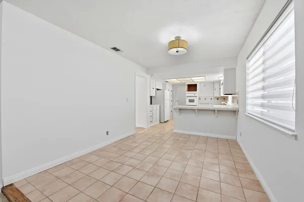 a view of a kitchen with a sink