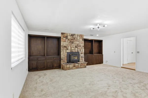 a view of a livingroom with a fireplace
