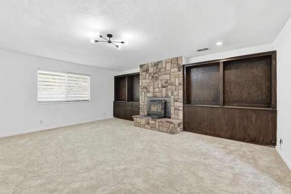 a view of a livingroom with a fireplace