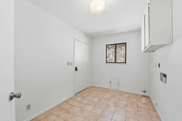 a view of a room with an empty space