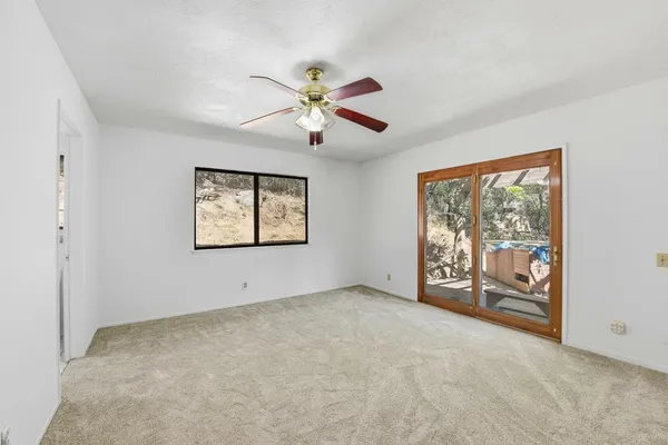 a view of an empty room with window