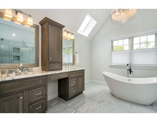 17 Ridgeway Avenue Needham, MA 02492 - Photo 16 of 30 a spacious bathroom with a tub sink and mirror