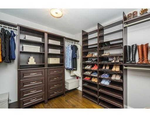 17 Ridgeway Avenue Needham, MA 02492 - Photo 19 of 30 a view of walk in closet with clothes and shoes