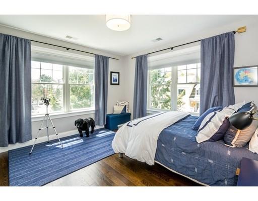 17 Ridgeway Avenue Needham, MA 02492 - Photo 23 of 30 a bedroom with a bed and a large window